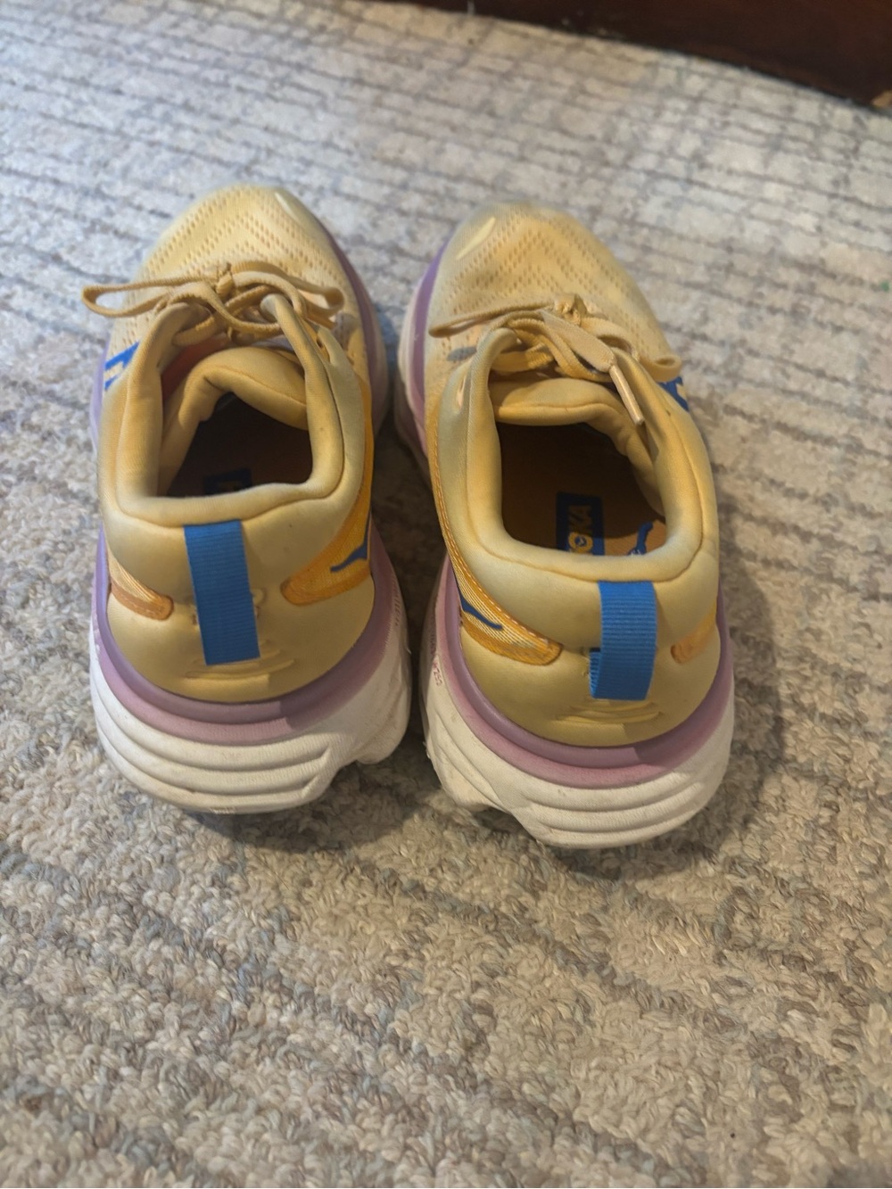 HOKA Women's Yellow Running Shoes with Blue Logo and Purple Midsole - Picture 2 of 5